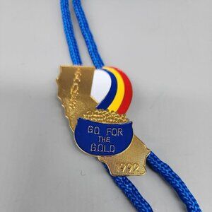 VINTAGE 1992 SHRINER ENAMEL MASONIC BOLO TIE GO FOR THE GOLD DESIGN